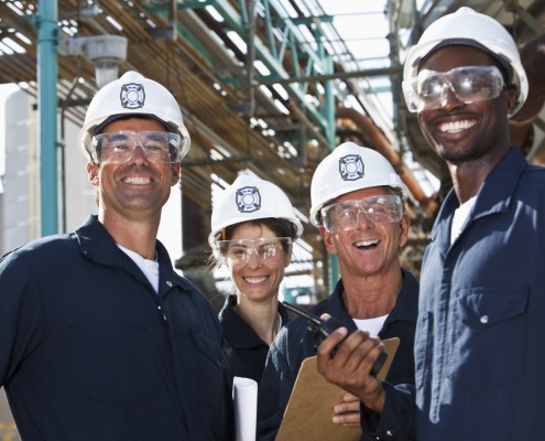 Group of workers at manufacturing plant